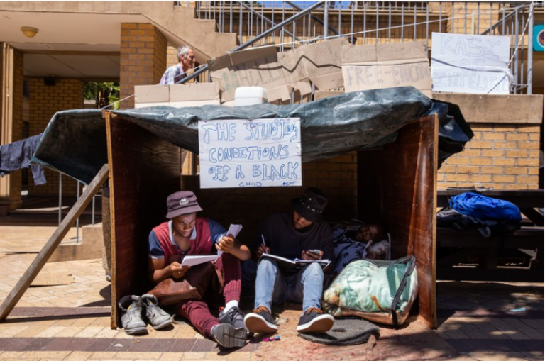 Students build shacks on campus in protest against accommodation shortage